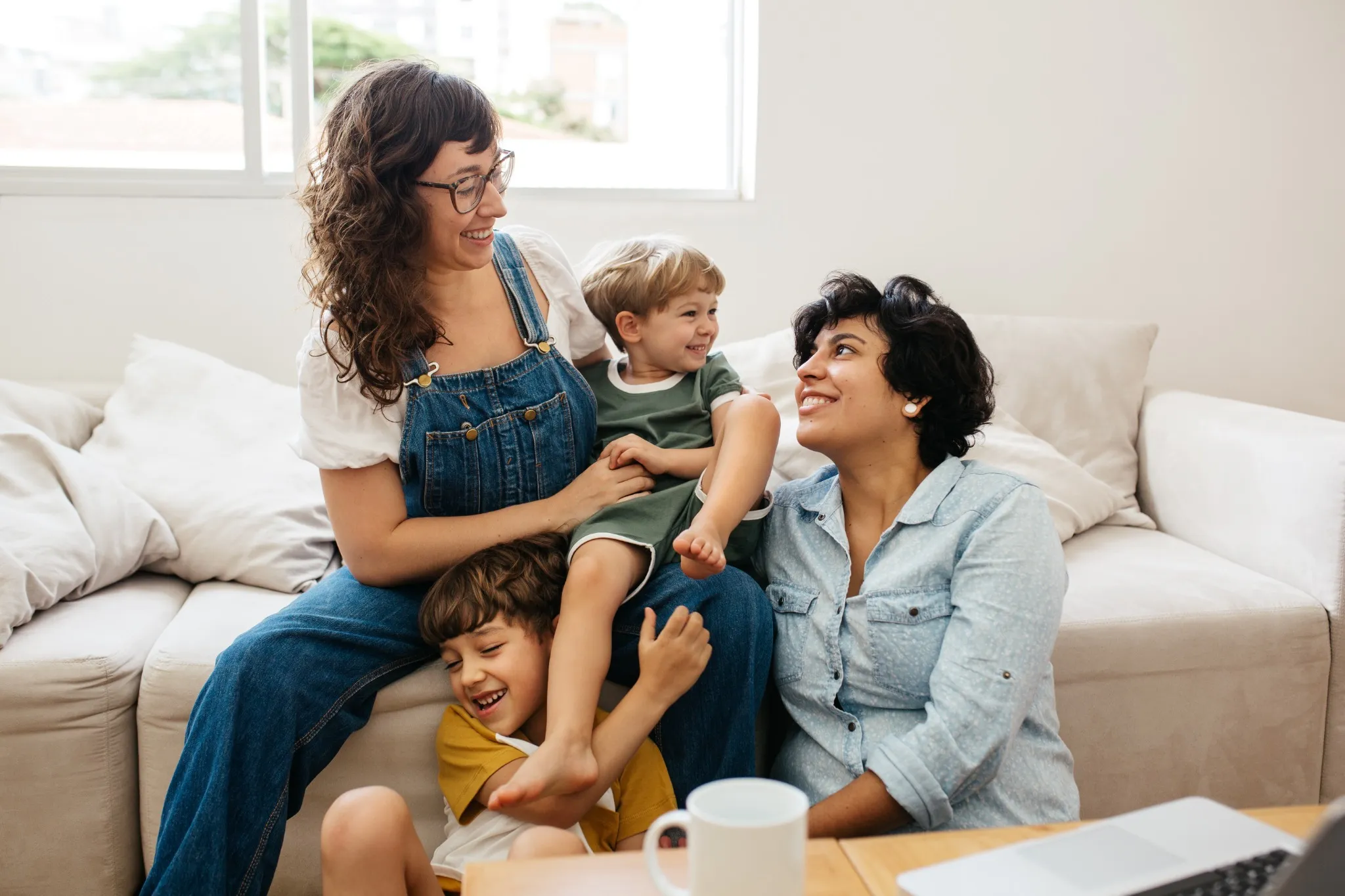 Couple on couch with kids